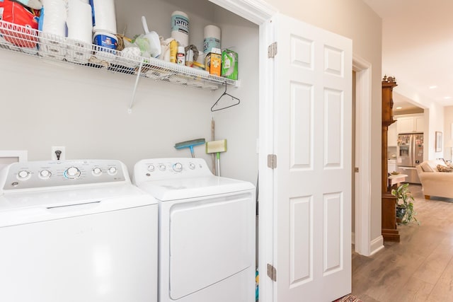 123 Beauregard Dr, Staunton, VA 24401 - laundry area with washing machine and dryer and light wood-style flooring