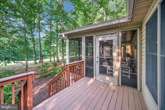 106 Tallwood Trl, Locust Grove, VA 22508 - wooden terrace featuring a sunroom and view of scattered trees
