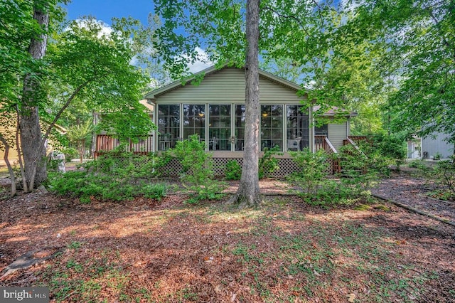 106 Tallwood Trl, Locust Grove, VA 22508 - back of house featuring a sunroom