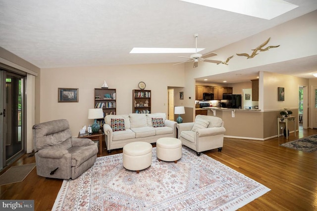 106 Tallwood Trl, Locust Grove, VA 22508 - living room featuring a skylight, dark wood-type flooring, lofted ceiling, and ceiling fan