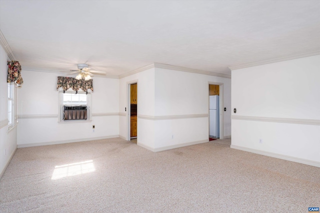 empty room with light colored carpet, a ceiling fan, ornamental molding, and cooling unit