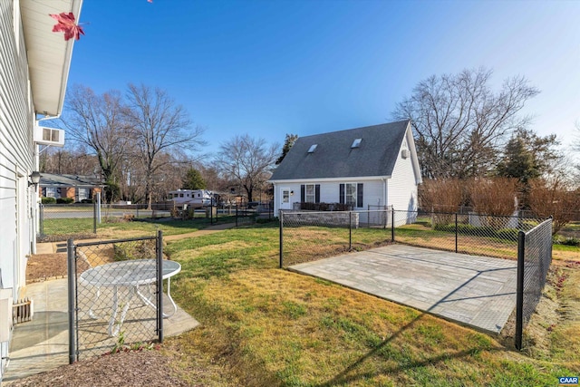 view of yard featuring a patio and fence