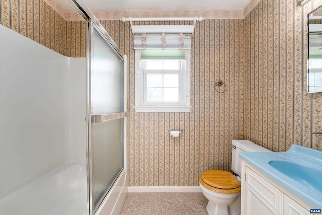 bathroom featuring wallpapered walls, toilet, baseboards, and vanity