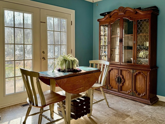 8127 Briery Branch Rd, Dayton, VA 22821 - dining room featuring baseboards and a healthy amount of sunlight