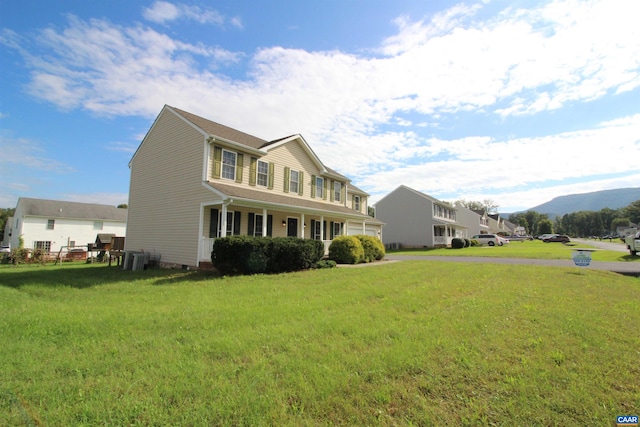 10 Lady Slipper Dr, Waynesboro, VA 22980 - view of front of property with a front lawn, a mountain view, and a porch