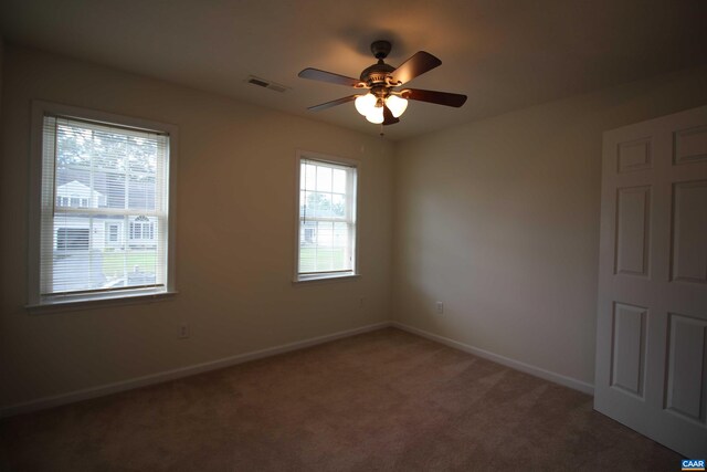 10 Lady Slipper Dr, Waynesboro, VA 22980 - empty room featuring a ceiling fan, light carpet, and baseboards