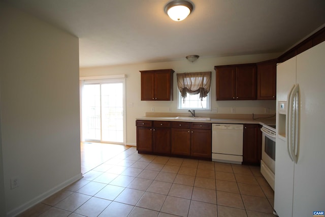 10 Lady Slipper Dr, Waynesboro, VA 22980 - kitchen with white appliances, light countertops, a sink, light tile patterned floors, and baseboards