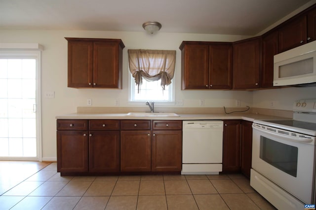 10 Lady Slipper Dr, Waynesboro, VA 22980 - kitchen with white appliances, a sink, light countertops, and light tile patterned floors