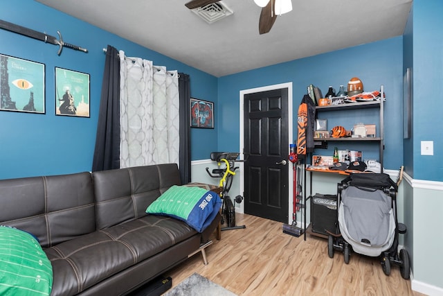 146 Harper St, Weyers Cave, VA 24486 - living area with wood finished floors, a ceiling fan, and baseboards