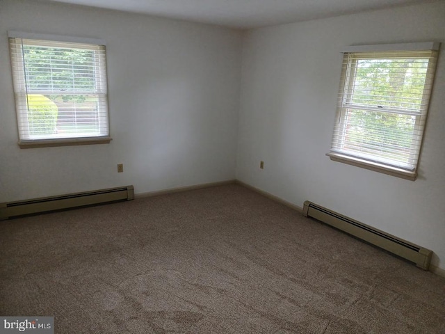16 Park Ave, Luray, VA 22835 - carpeted spare room with a baseboard radiator and plenty of natural light
