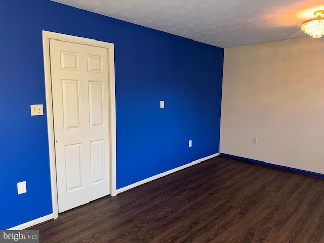 16 Park Ave, Luray, VA 22835 - unfurnished room with dark wood-type flooring and a textured ceiling