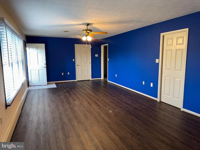 16 Park Ave, Luray, VA 22835 - empty room with ceiling fan, dark wood finished floors, and a baseboard heating unit