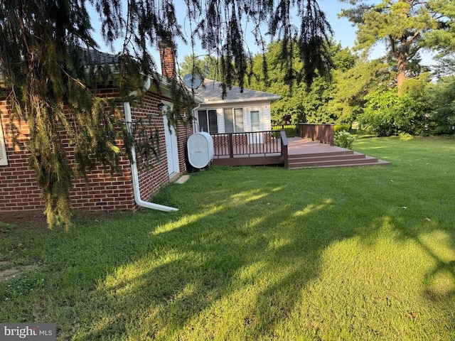 16 Park Ave, Luray, VA 22835 - view of green lawn with a wooden deck