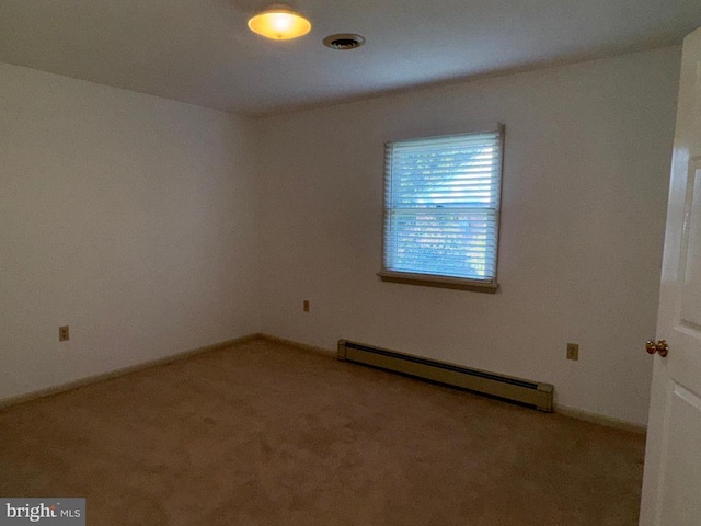 16 Park Ave, Luray, VA 22835 - empty room with a baseboard heating unit and carpet floors