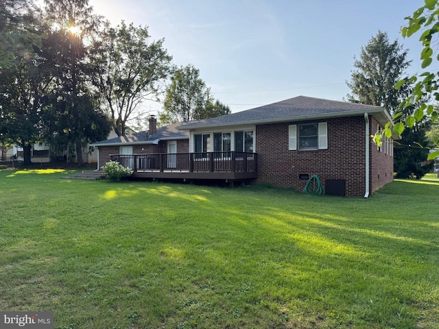 16 Park Ave, Luray, VA 22835 - back of house featuring brick siding, a wooden deck, and a yard