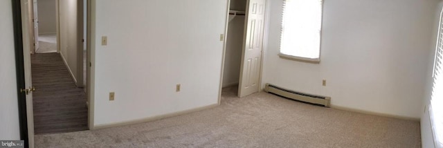 16 Park Ave, Luray, VA 22835 - unfurnished bedroom with a baseboard heating unit, carpet flooring, and a closet