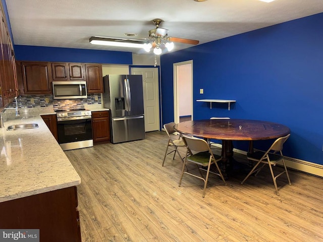 16 Park Ave, Luray, VA 22835 - dining area with light wood-type flooring and a ceiling fan