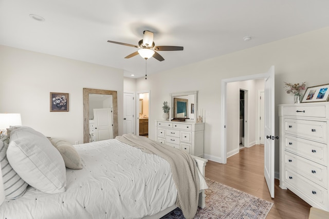141 Tomasville Dr, Waynesboro, VA 22980 - bedroom featuring ensuite bathroom, wood finished floors, recessed lighting, ceiling fan, and baseboards