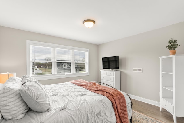 141 Tomasville Dr, Waynesboro, VA 22980 - bedroom with visible vents, wood finished floors, and baseboards