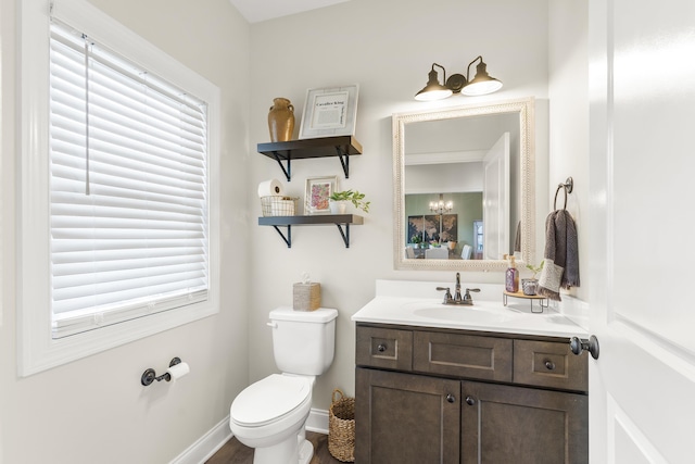 141 Tomasville Dr, Waynesboro, VA 22980 - bathroom featuring a wealth of natural light, toilet, baseboards, and vanity