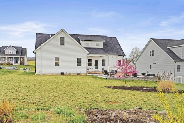 141 Tomasville Dr, Waynesboro, VA 22980 - back of property with a lawn, a patio area, roof with shingles, and crawl space