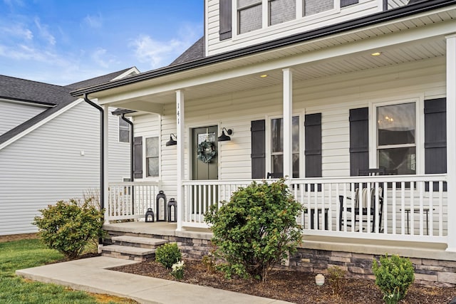 141 Tomasville Dr, Waynesboro, VA 22980 - view of exterior entry with a porch and roof with shingles
