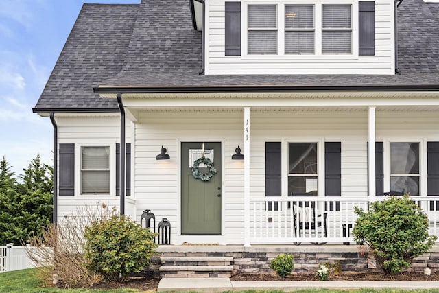 141 Tomasville Dr, Waynesboro, VA 22980 - view of exterior entry with a shingled roof and covered porch