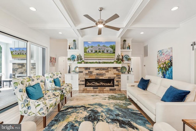 11206 Preswick Ln, Spotsylvania, VA 22551 - living area featuring wood finished floors, coffered ceiling, ceiling fan, beam ceiling, and a fireplace