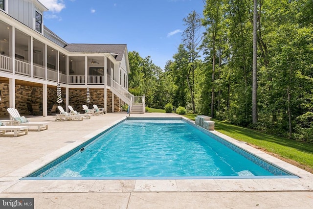 11206 Preswick Ln, Spotsylvania, VA 22551 - outdoor pool featuring ceiling fan, a patio, stairs, a sunroom, and a lawn