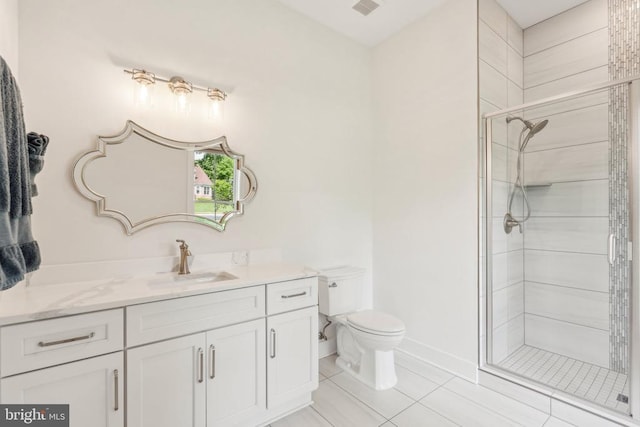 11206 Preswick Ln, Spotsylvania, VA 22551 - full bath featuring vanity, a stall shower, toilet, tile patterned floors, and baseboards