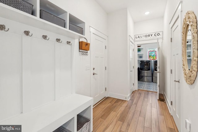 11206 Preswick Ln, Spotsylvania, VA 22551 - mudroom with independent washer and dryer, light wood-style floors, baseboards, and recessed lighting