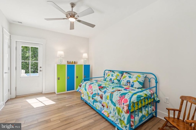 11206 Preswick Ln, Spotsylvania, VA 22551 - bedroom featuring wood finished floors, baseboards, and a ceiling fan