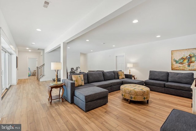 11206 Preswick Ln, Spotsylvania, VA 22551 - living area featuring light wood finished floors, stairs, and recessed lighting