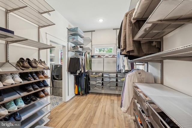 11206 Preswick Ln, Spotsylvania, VA 22551 - walk in closet with light wood-style flooring and washer / clothes dryer