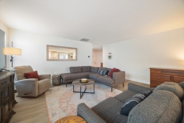 living room featuring light hardwood / wood-style floors