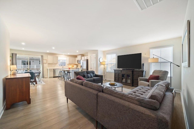 living room featuring light hardwood / wood-style floors