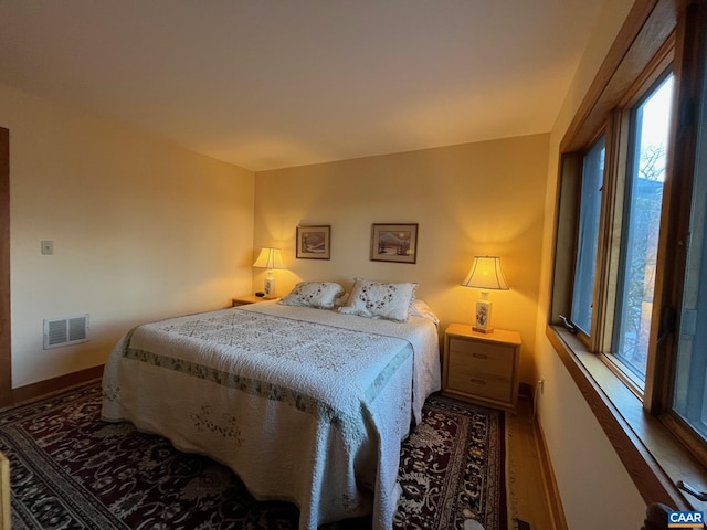 100 N Rock Tree Ln, Wintergreen Resort, VA 22967 - bedroom featuring wood finished floors and baseboards