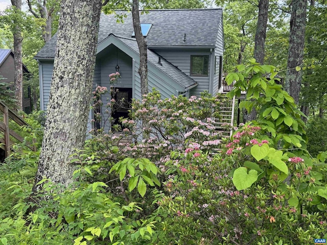 100 N Rock Tree Ln, Wintergreen Resort, VA 22967 - view of front facade featuring roof with shingles and stairs