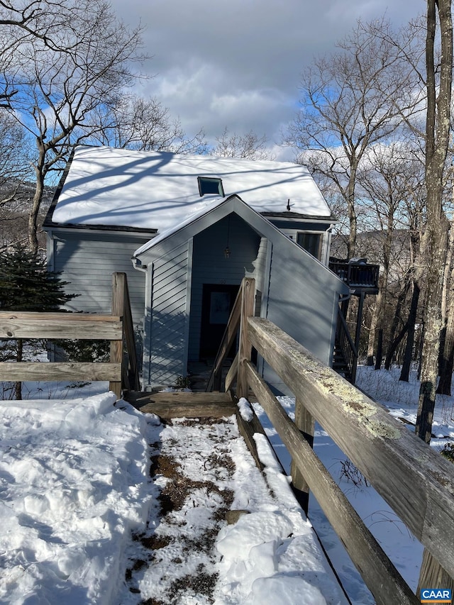 100 N Rock Tree Ln, Wintergreen Resort, VA 22967 - view of snowy exterior with entry steps