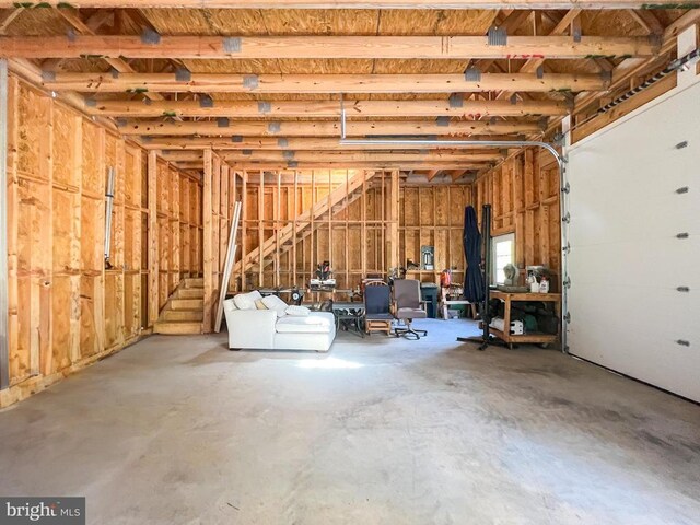 8800 General Griffins Ct, Fredericksburg, VA 22407 - miscellaneous room featuring concrete flooring and a garage