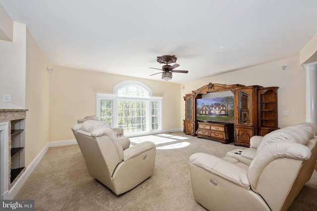 8800 General Griffins Ct, Fredericksburg, VA 22407 - living area featuring ceiling fan, light colored carpet, baseboards, and a fireplace