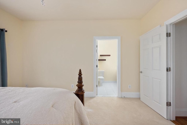 8800 General Griffins Ct, Fredericksburg, VA 22407 - bedroom with carpet flooring, baseboards, and ensuite bathroom