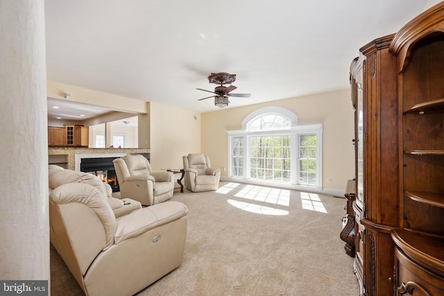 8800 General Griffins Ct, Fredericksburg, VA 22407 - living area with ceiling fan, carpet floors, and a glass covered fireplace