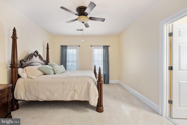 8800 General Griffins Ct, Fredericksburg, VA 22407 - bedroom with light colored carpet, baseboards, and a ceiling fan