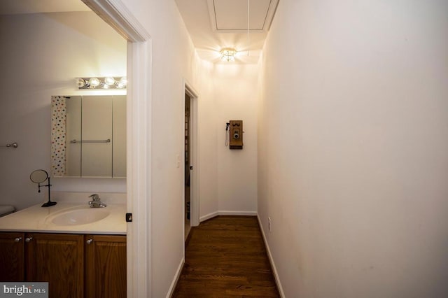 625 Yorktown Blvd, Locust Grove, VA 22508 - bathroom with vanity, wood finished floors, and baseboards