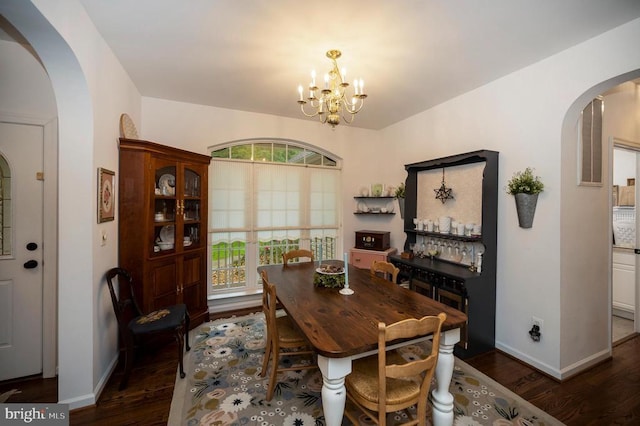 625 Yorktown Blvd, Locust Grove, VA 22508 - dining area featuring arched walkways, wood finished floors, a chandelier, and baseboards