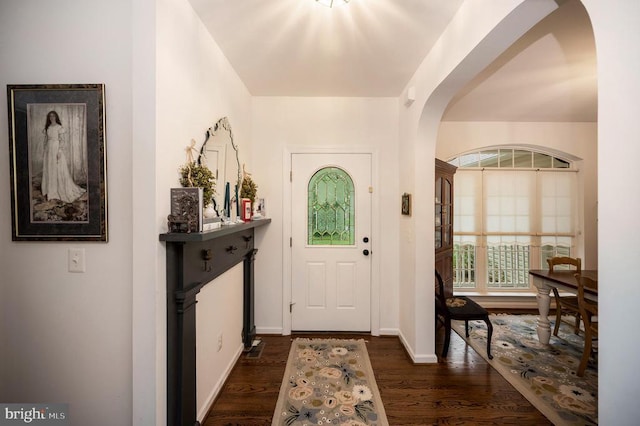 625 Yorktown Blvd, Locust Grove, VA 22508 - entryway featuring dark wood finished floors, arched walkways, and baseboards
