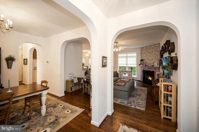 625 Yorktown Blvd, Locust Grove, VA 22508 - hallway featuring wood finished floors, baseboards, and arched walkways