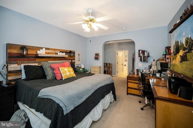 625 Yorktown Blvd, Locust Grove, VA 22508 - carpeted bedroom with arched walkways, a desk, and ceiling fan