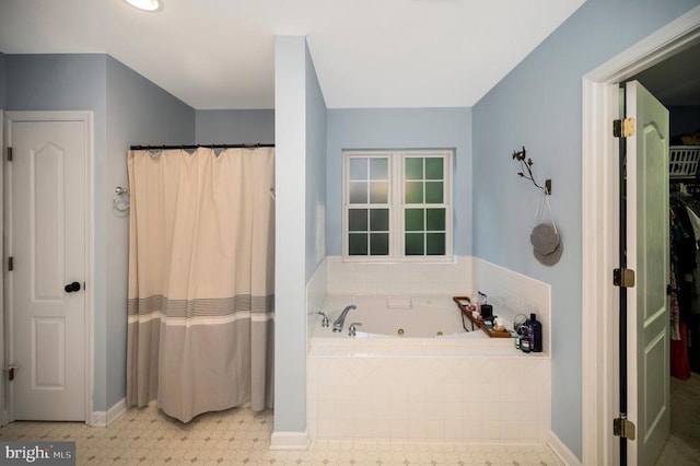 625 Yorktown Blvd, Locust Grove, VA 22508 - full bathroom featuring a jetted tub, a shower with curtain, and baseboards